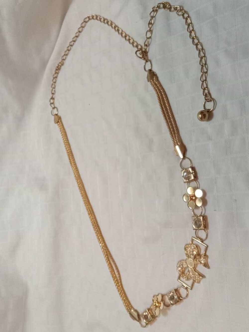 Pretty belt with bow and flowers in a golden color 49 inches